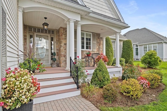 doorway to property featuring a porch