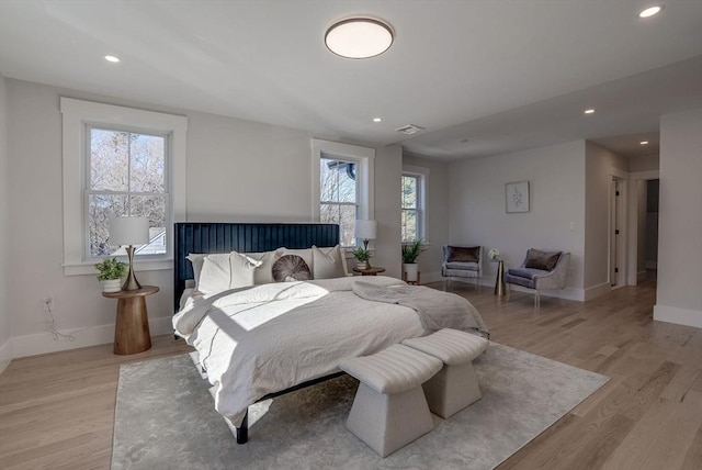 bedroom with light hardwood / wood-style flooring