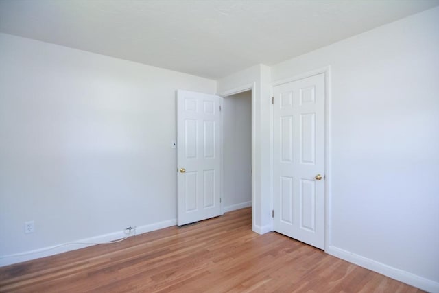 248 Levin Rd, Rockland, MA 02370 - unfurnished bedroom with light wood-style flooring and baseboards