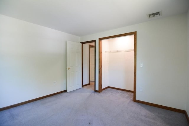 248 Levin Rd, Rockland, MA 02370 - unfurnished bedroom featuring carpet floors, baseboards, and a closet