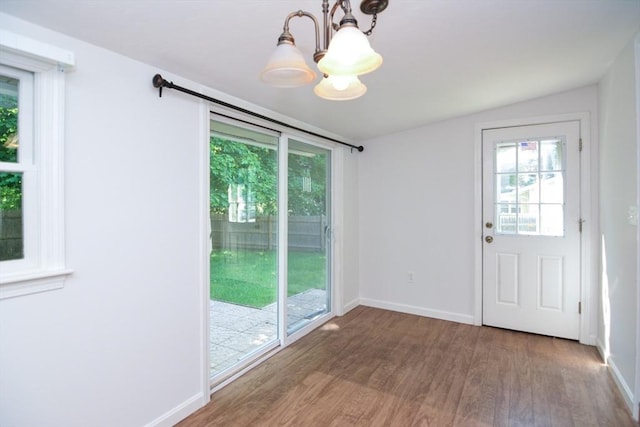 248 Levin Rd, Rockland, MA 02370 - doorway with a chandelier, wood finished floors, healthy amount of natural light, and baseboards