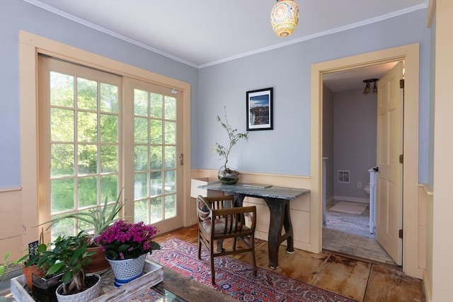 391 Brookfield Rd, Brimfield, MA 01010 - dining room featuring light wood finished floors, healthy amount of natural light, and ornamental molding
