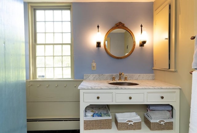 391 Brookfield Rd, Brimfield, MA 01010 - bathroom featuring a baseboard radiator and vanity