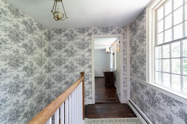 391 Brookfield Rd, Brimfield, MA 01010 - corridor featuring hardwood / wood-style floors, a baseboard radiator, and wallpapered walls