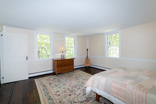 391 Brookfield Rd, Brimfield, MA 01010 - bedroom with a baseboard heating unit, wood finished floors, and a baseboard radiator
