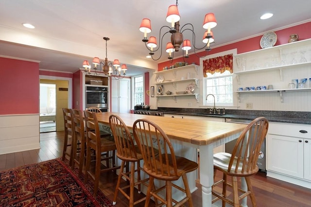 391 Brookfield Rd, Brimfield, MA 01010 - kitchen with open shelves, a chandelier, a sink, dark wood finished floors, and a center island