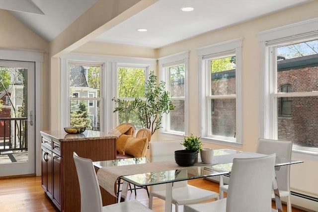 sunroom featuring baseboard heating