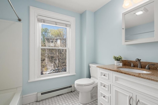 full bathroom with vanity, toilet, and a baseboard radiator