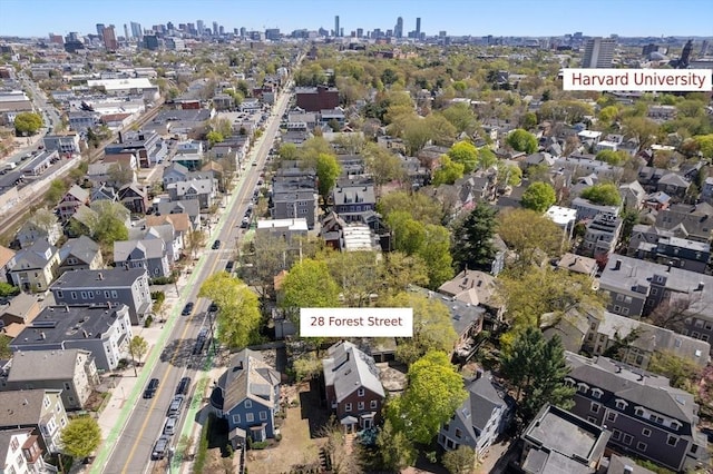 drone / aerial view with a view of city and a residential view