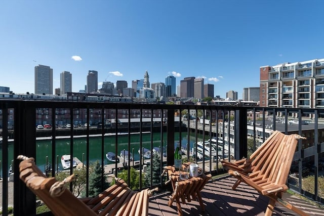 balcony featuring a water view