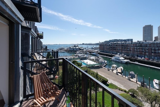 balcony featuring a water view