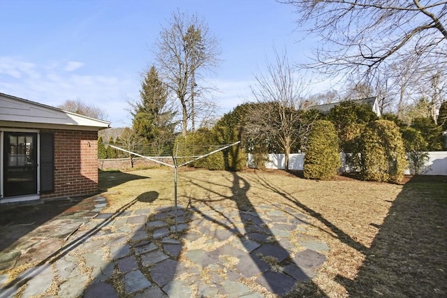 view of yard featuring a patio and fence private yard