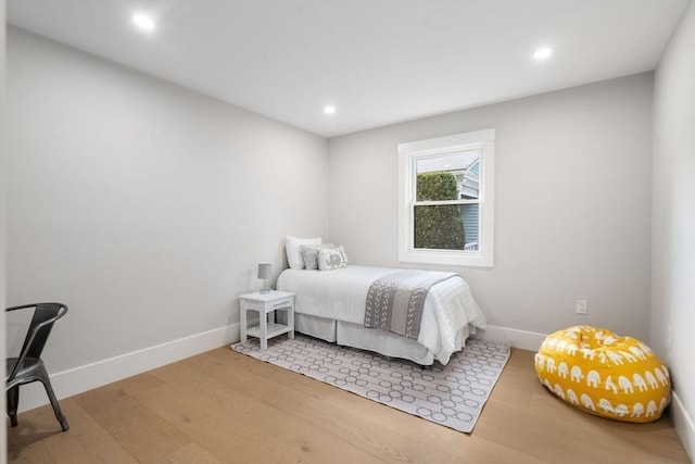 137-139 Crafts St, Newton, MA 02460 - bedroom with baseboards, light wood-type flooring, and recessed lighting