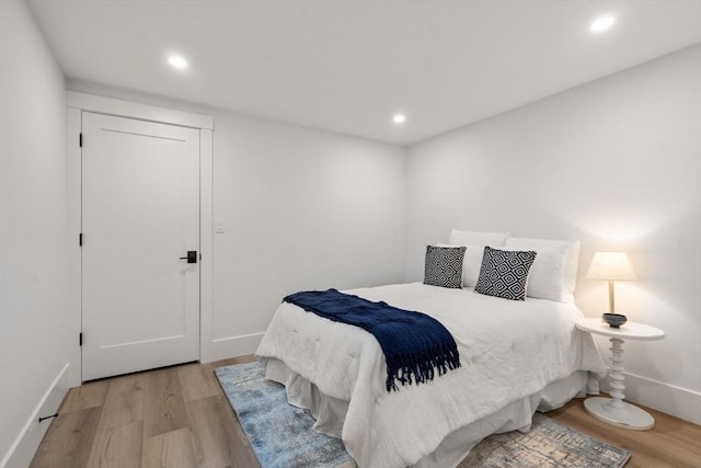 137-139 Crafts St, Newton, MA 02460 - bedroom featuring light wood finished floors, recessed lighting, and baseboards