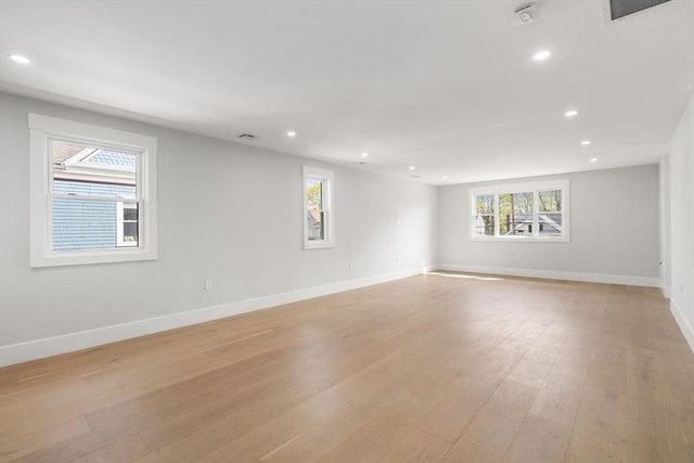 137-139 Crafts St, Newton, MA 02460 - empty room with recessed lighting, light wood-type flooring, baseboards, and a smoke detector
