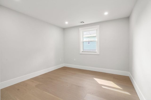 137-139 Crafts St, Newton, MA 02460 - spare room featuring light wood-style flooring, baseboards, and recessed lighting