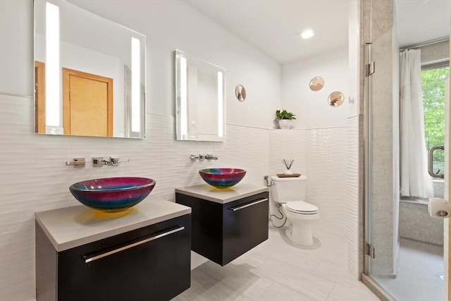 887 High Rock Rd, Fitchburg, MA 01420 - full bath with vanity, a shower stall, tile walls, and toilet