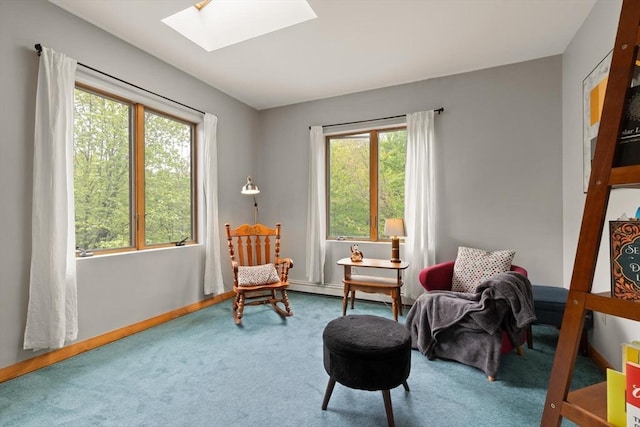 887 High Rock Rd, Fitchburg, MA 01420 - living area with a skylight, carpet flooring, healthy amount of natural light, and baseboards
