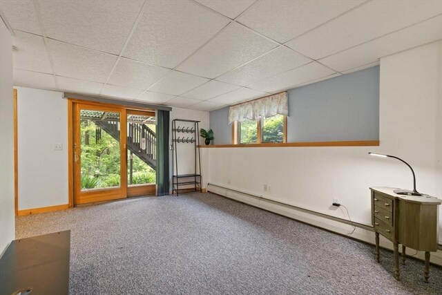 887 High Rock Rd, Fitchburg, MA 01420 - below grade area with a drop ceiling, a baseboard radiator, and baseboards