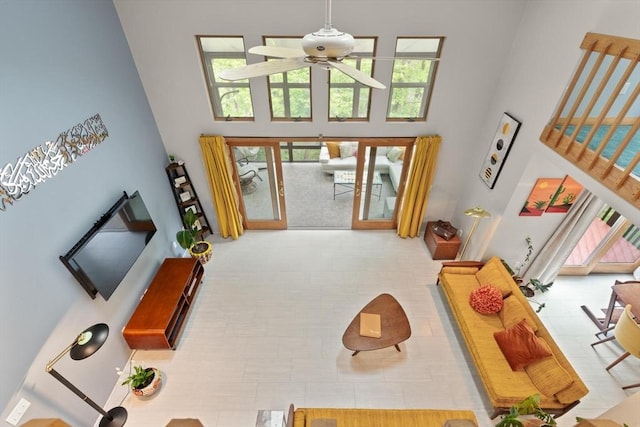 887 High Rock Rd, Fitchburg, MA 01420 - living area featuring a towering ceiling, a ceiling fan, and tile patterned floors