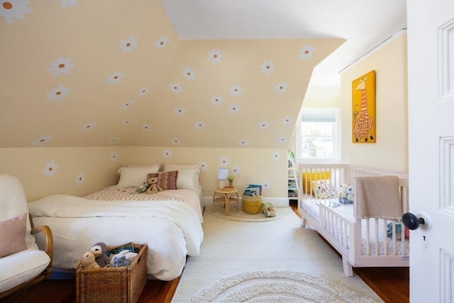 26 Moultrie St Unit 26, Boston, MA 02124 - bedroom featuring lofted ceiling and wood finished floors