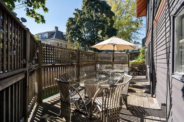 26 Moultrie St Unit 26, Boston, MA 02124 - wooden deck featuring outdoor dining space