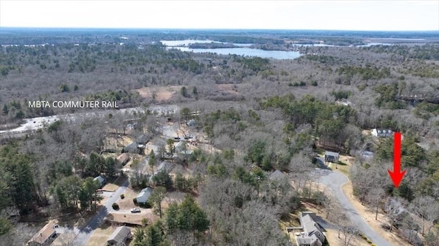 aerial view with a wooded view