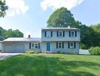 32 Nancy Rd, Milford, MA 01757 - view of front of property featuring a garage, a front lawn, and driveway