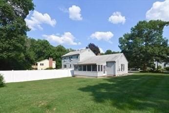 32 Nancy Rd, Milford, MA 01757 - rear view of property with a sunroom