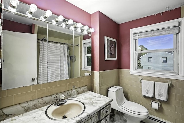 32 Nancy Rd, Milford, MA 01757 - bathroom with a baseboard heating unit, tile walls, vanity, wainscoting, and curtained shower