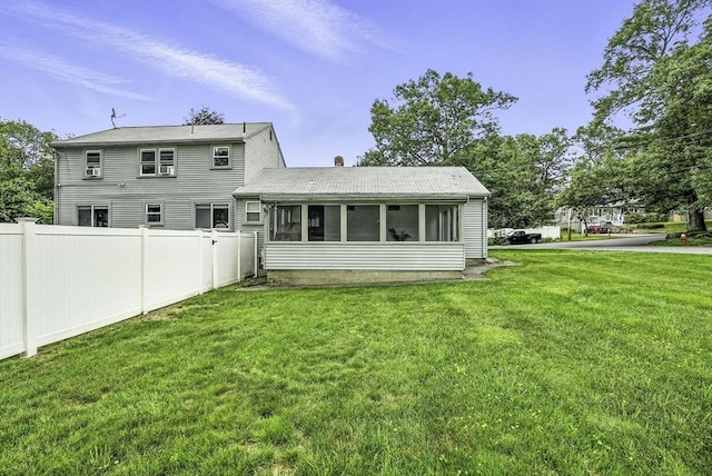 32 Nancy Rd, Milford, MA 01757 - rear view of property with a sunroom