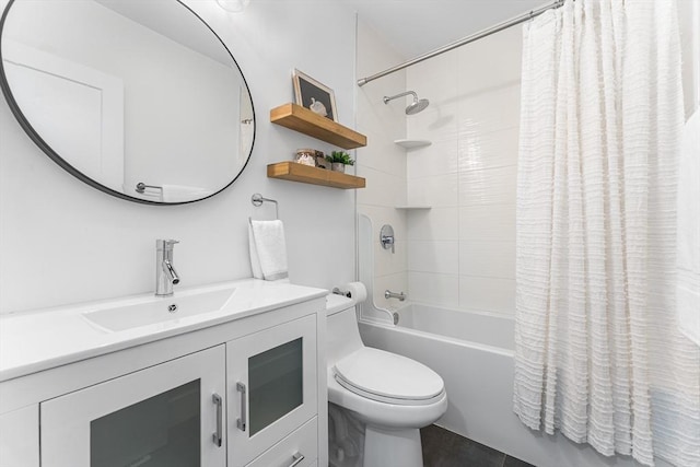 full bathroom featuring shower / tub combo, toilet, and vanity