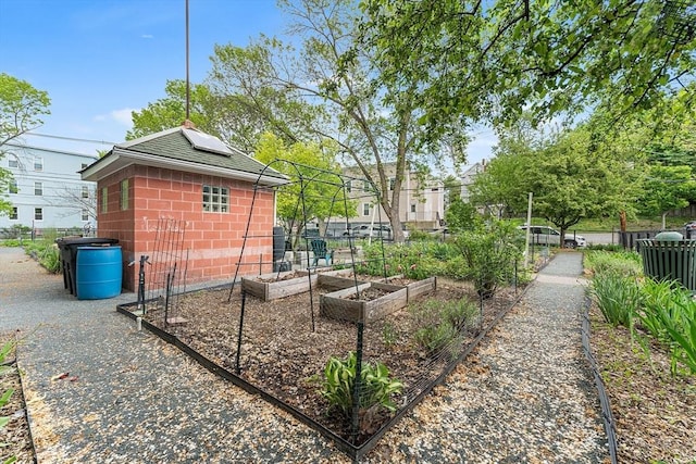 view of yard featuring a garden and fence