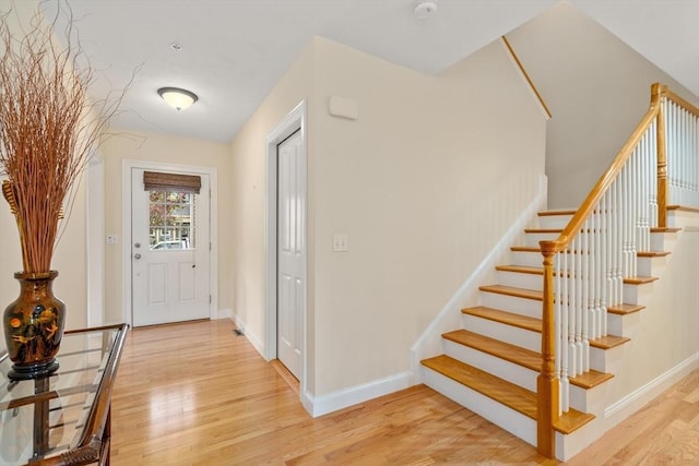 32 Old Framingham Rd Unit 34, Sudbury, MA 01776 - entryway with light wood-type flooring and stairway
