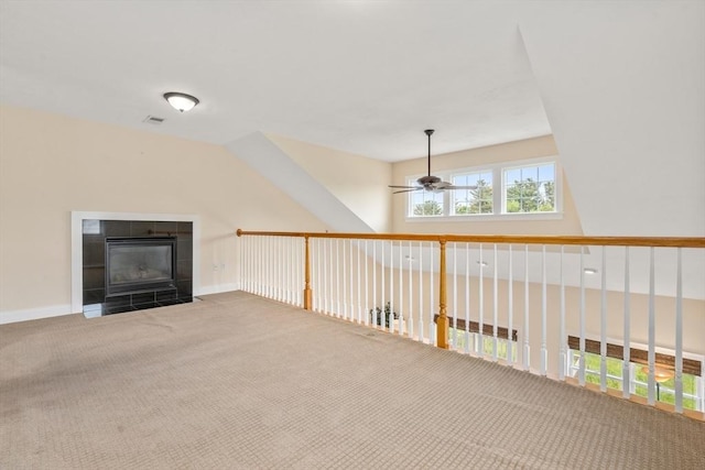 32 Old Framingham Rd Unit 34, Sudbury, MA 01776 - unfurnished living room featuring ceiling fan, carpet, and a tiled fireplace