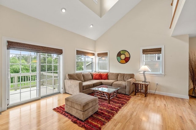 32 Old Framingham Rd Unit 34, Sudbury, MA 01776 - living room with light wood-type flooring, high vaulted ceiling, and recessed lighting