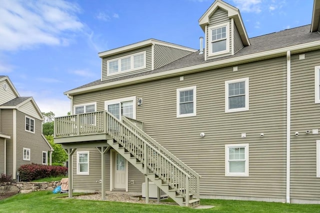 32 Old Framingham Rd Unit 34, Sudbury, MA 01776 - rear view of property with stairs, a deck, and a yard