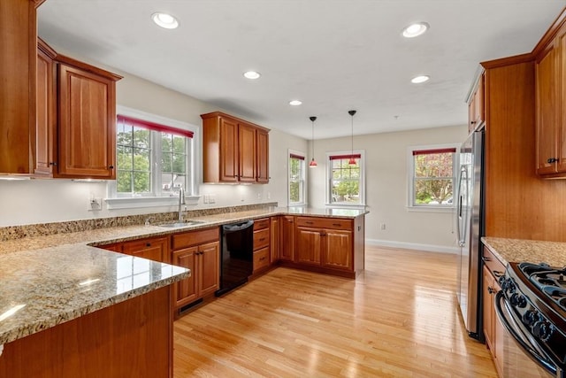 32 Old Framingham Rd Unit 34, Sudbury, MA 01776 - kitchen with dishwasher, freestanding refrigerator, a peninsula, brown cabinets, and recessed lighting