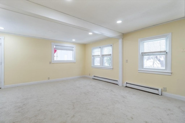 carpeted spare room featuring beamed ceiling and a baseboard radiator