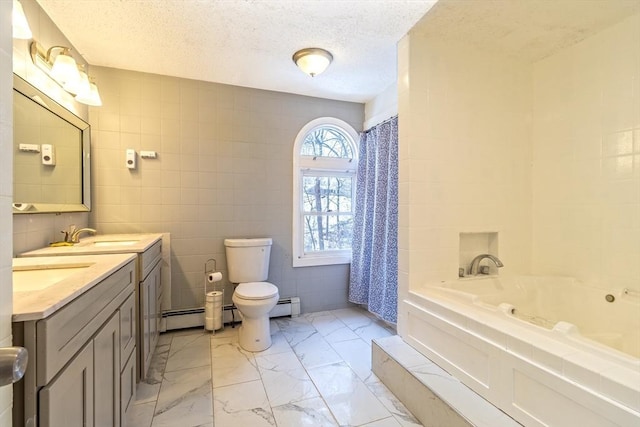 bathroom with toilet, tile walls, a textured ceiling, vanity, and a washtub