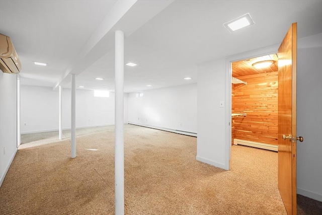 basement with a baseboard heating unit, carpet floors, a wall mounted AC, and wooden walls