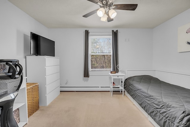 bedroom with ceiling fan, light colored carpet, and baseboard heating