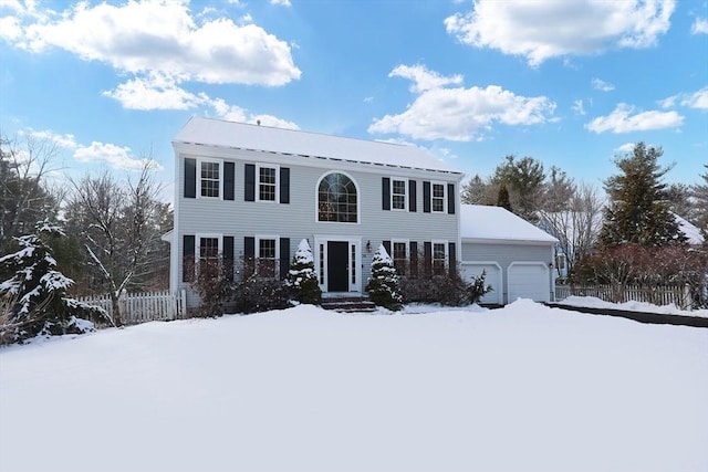 colonial-style house with a garage