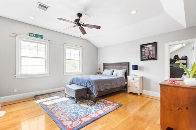 bedroom featuring baseboards, light wood-style floors, lofted ceiling, ceiling fan, and recessed lighting