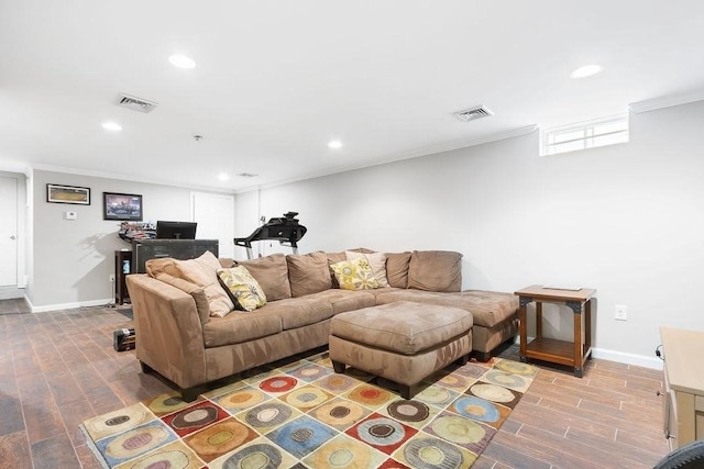 living area featuring wood finished floors, recessed lighting, crown molding, and baseboards