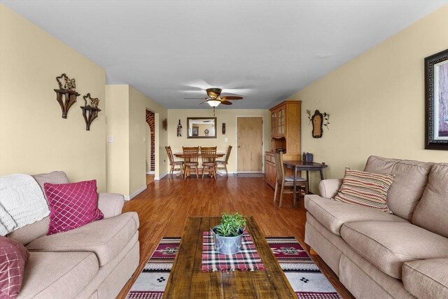 1321 Worcester Rd Unit 605, Framingham, MA 01701 - living area featuring wood finished floors and a ceiling fan