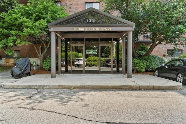 1321 Worcester Rd Unit 605, Framingham, MA 01701 - entrance to property featuring brick siding