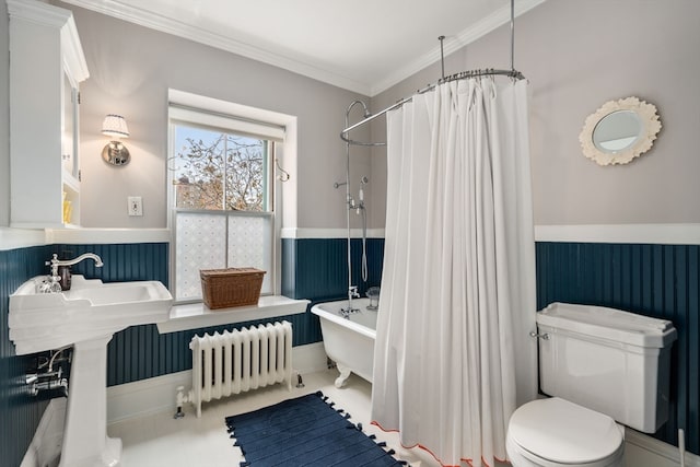 bathroom with tile flooring, ornamental molding, toilet, and radiator