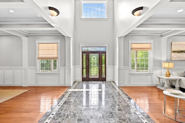33 Moniz Dr, Westport, MA 02790 - foyer with ornate columns, a decorative wall, recessed lighting, and wainscoting