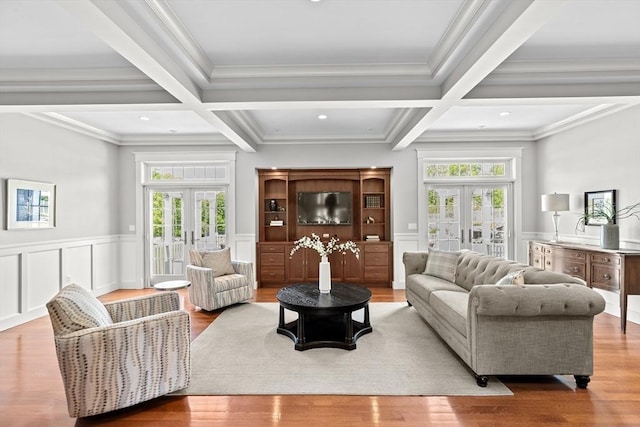 33 Moniz Dr, Westport, MA 02790 - living room featuring french doors, coffered ceiling, crown molding, beamed ceiling, and wood finished floors